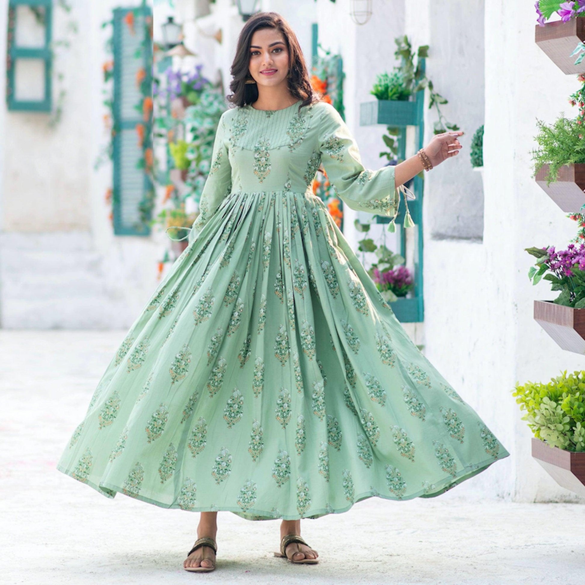 Marvellous Moss Green Colored Partywear Digital Printed Pure Muslin Gown