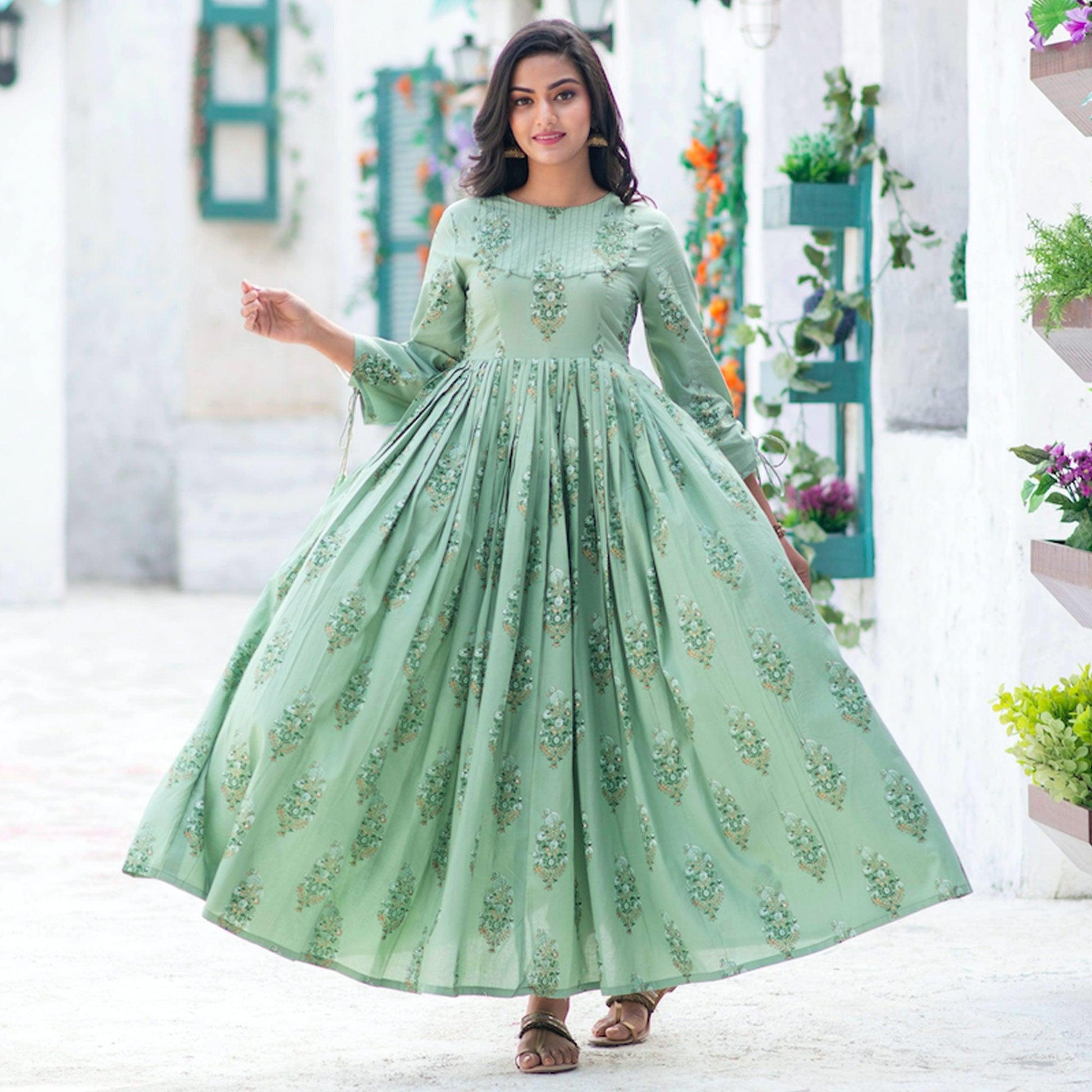 Marvellous Moss Green Colored Partywear Digital Printed Pure Muslin Gown