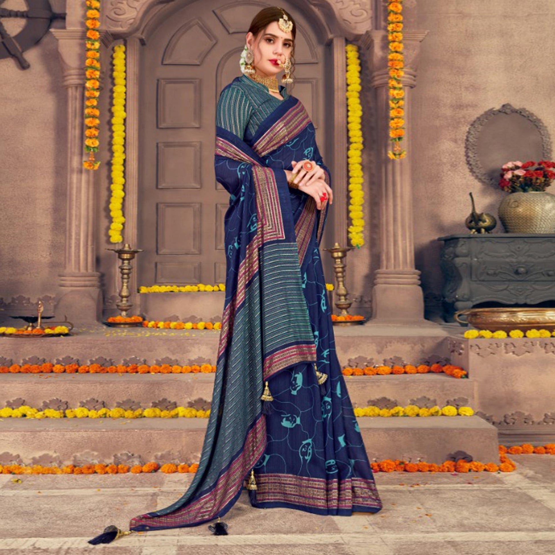 Marvellous Navy Blue Colored Festive Wear Printed Georgette Saree With Tassels
