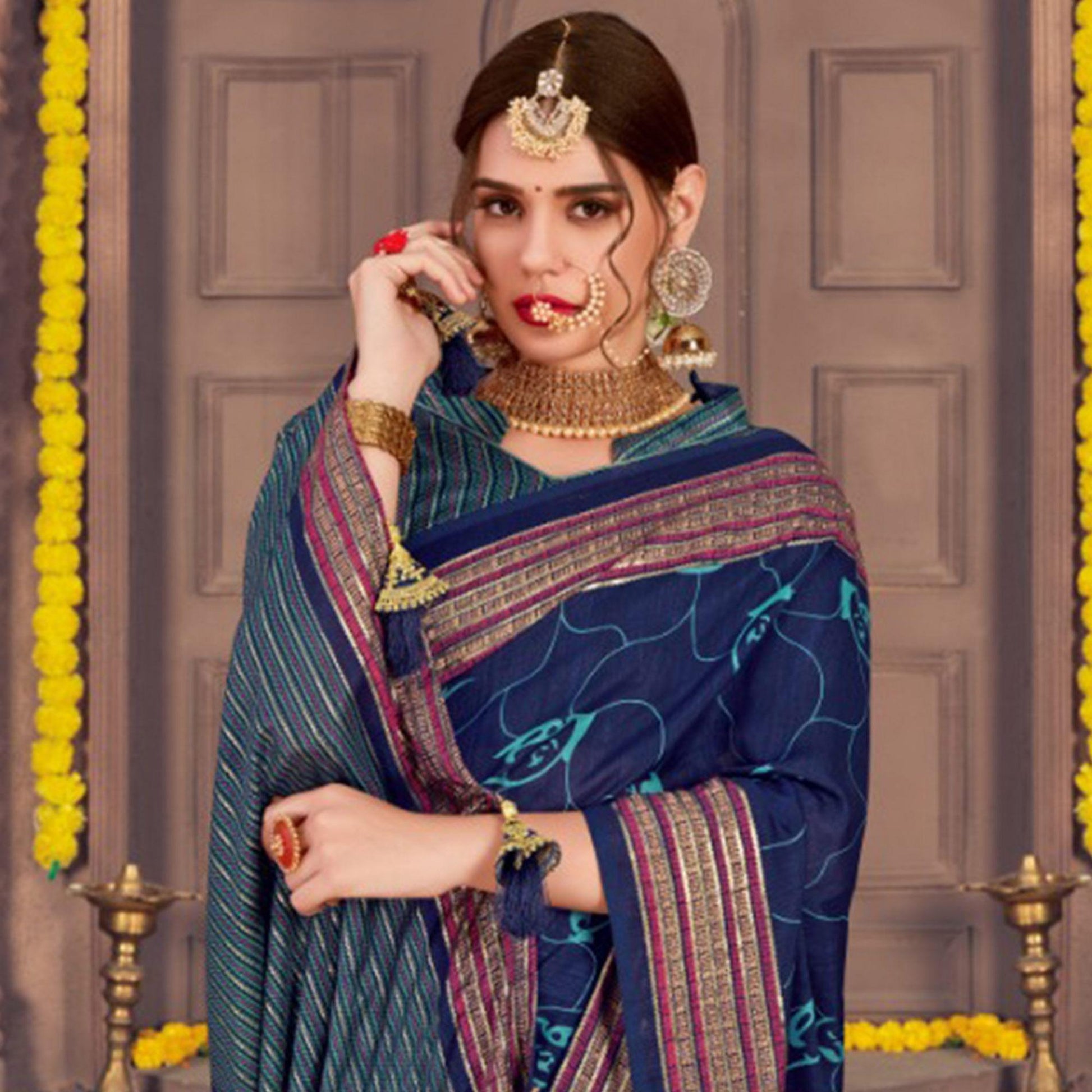 Marvellous Navy Blue Colored Festive Wear Printed Georgette Saree With Tassels