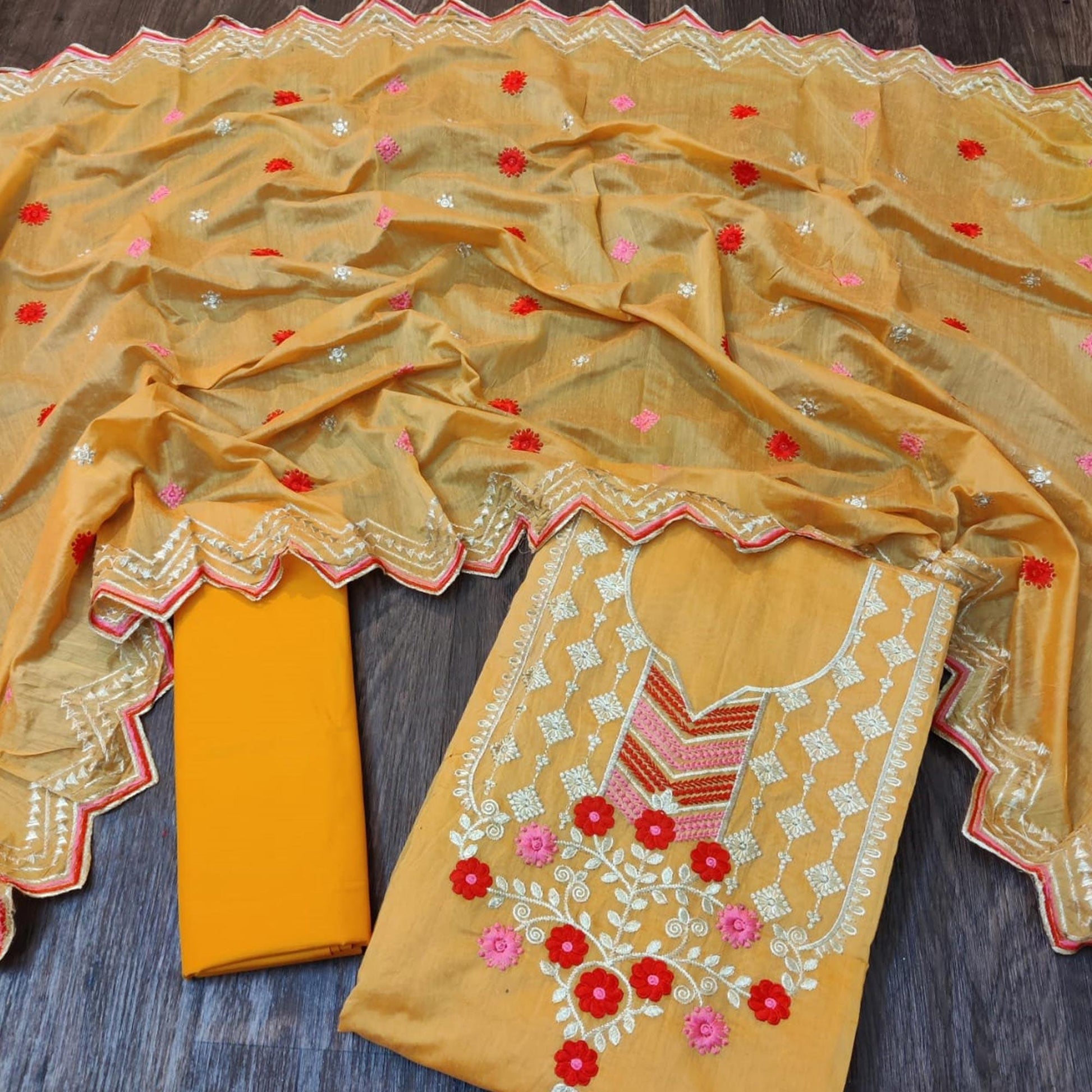 Marvellous Orange Colored Casual Wear Embroidered Chanderi Dress Material