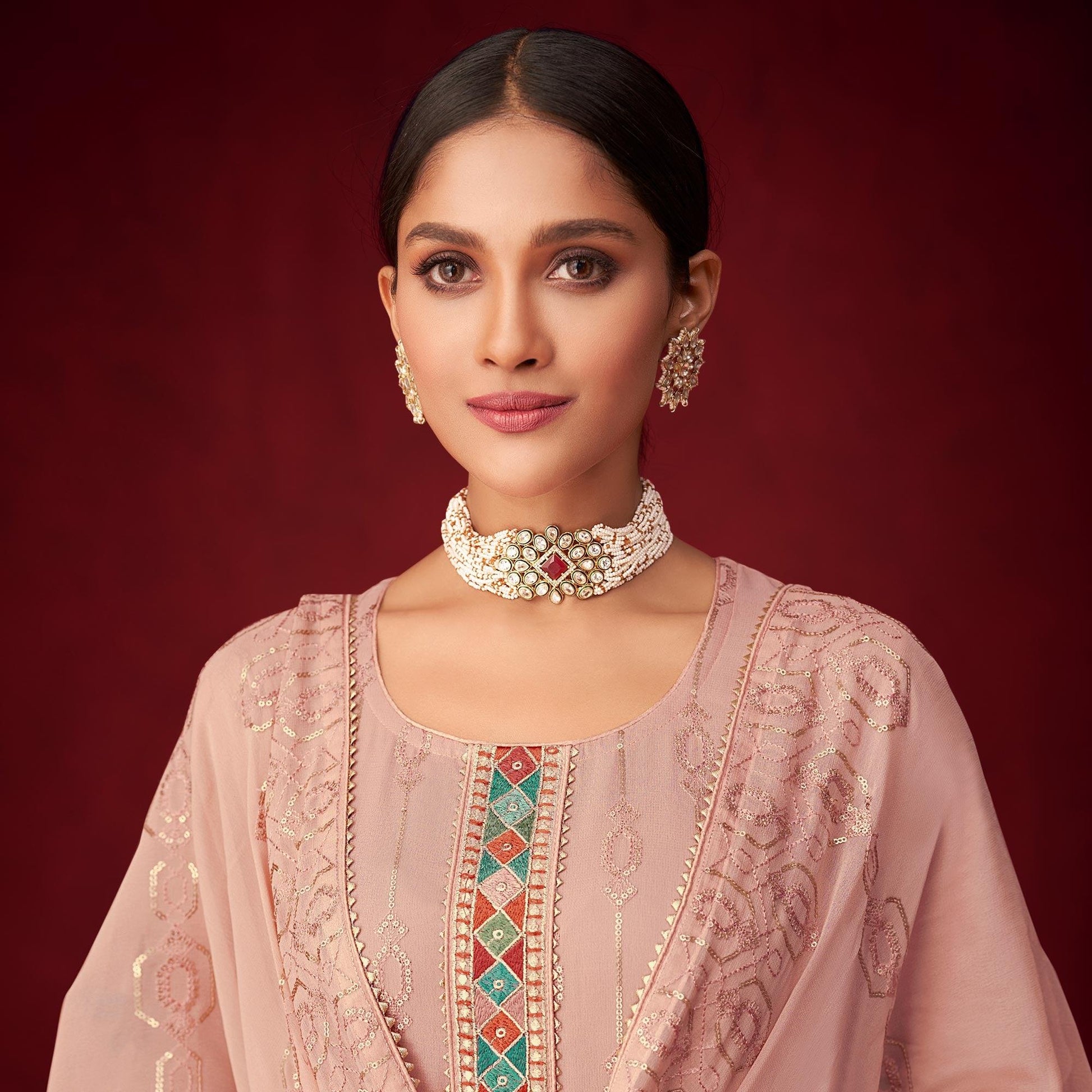 Mauve Sequins Embroidered Georgette Partywear Suit