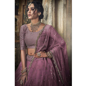 Mauve Sequins Embroidered Net Lehenga Choli