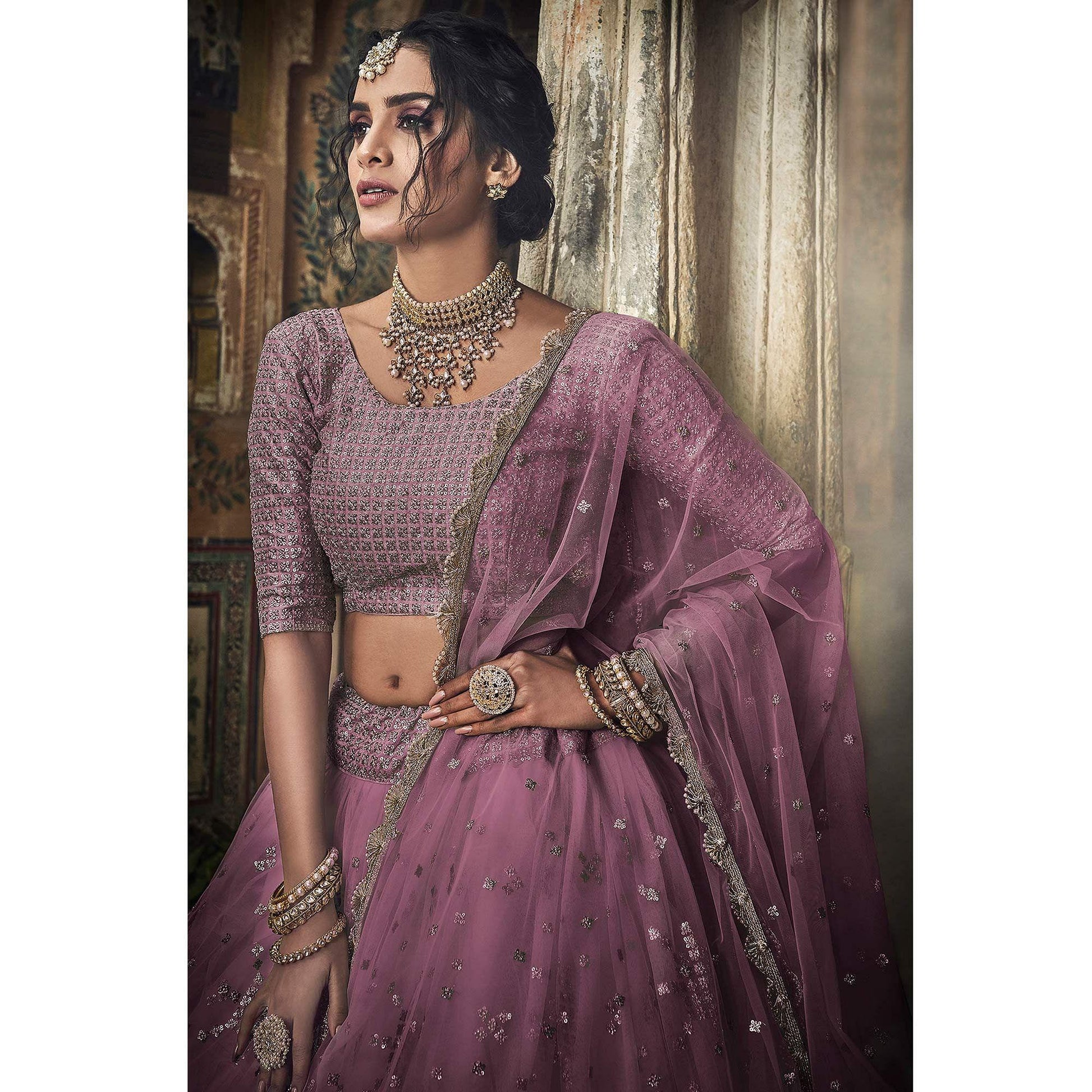Mauve Sequins Embroidered Net Lehenga Choli