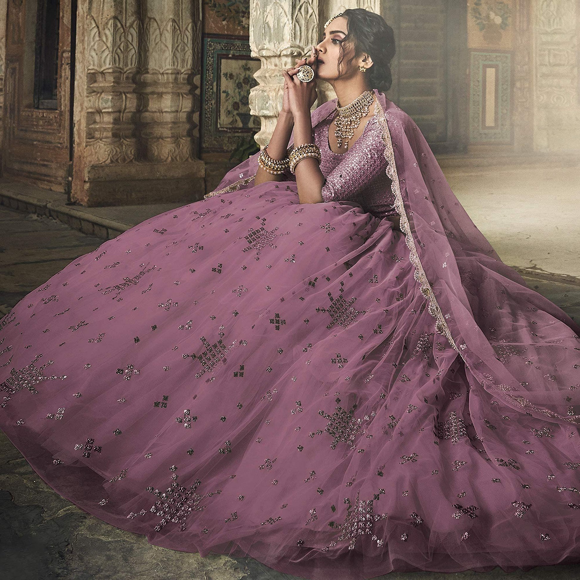 Mauve Sequins Embroidered Net Lehenga Choli