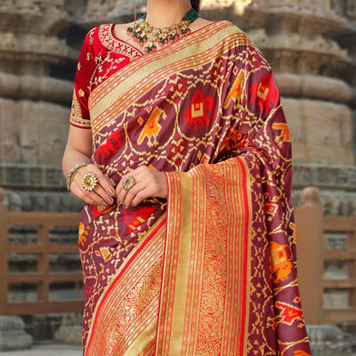 Mauve Wedding Wear Woven Silk Saree With Tassels
