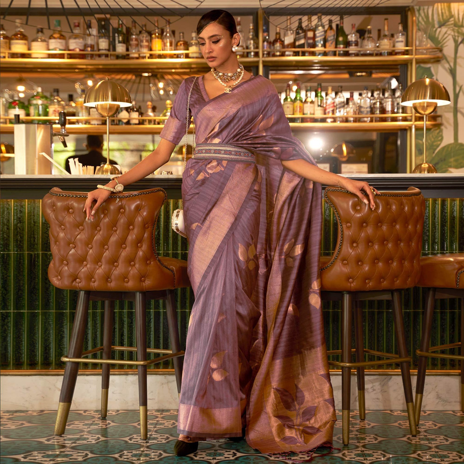Mauve Woven Art Silk Saree With Tassels