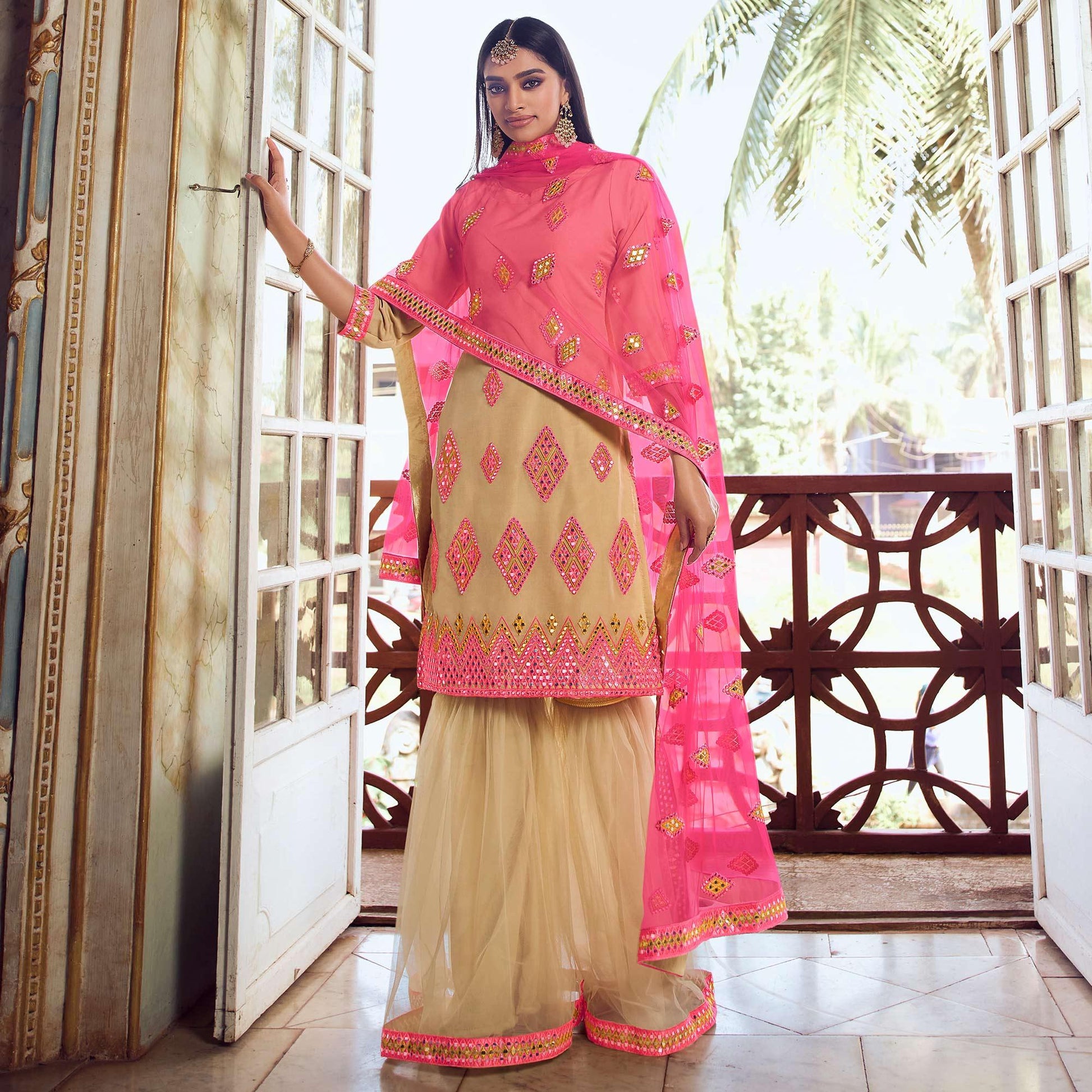 Mesmeric Beige Coloured Partywear Thread Foil Mirror Work Organza Pallazo Suit