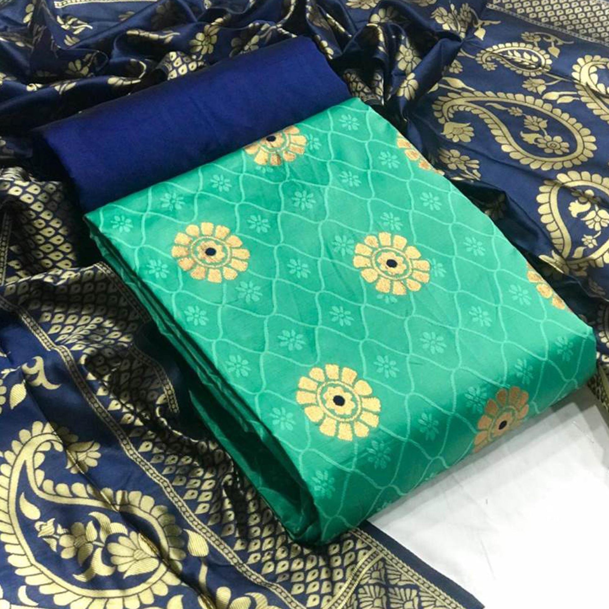 Mesmeric Sea Green Colored Casual Wear Banarasi Silk Dress Material