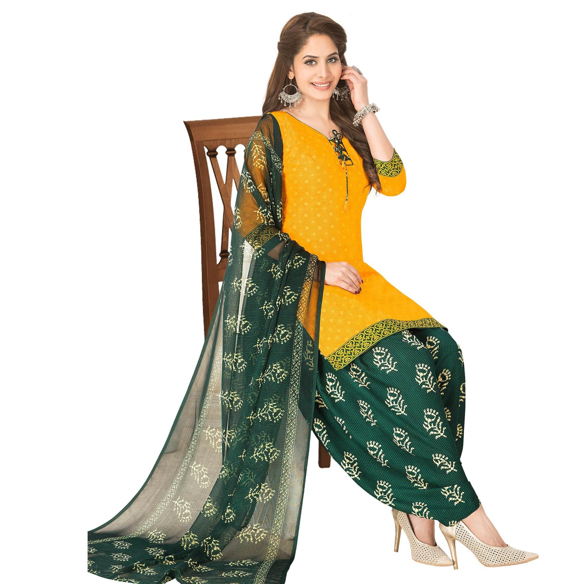 Mesmeric Yellow Colored Casual Wear Printed Crepe Patiala Dress Material