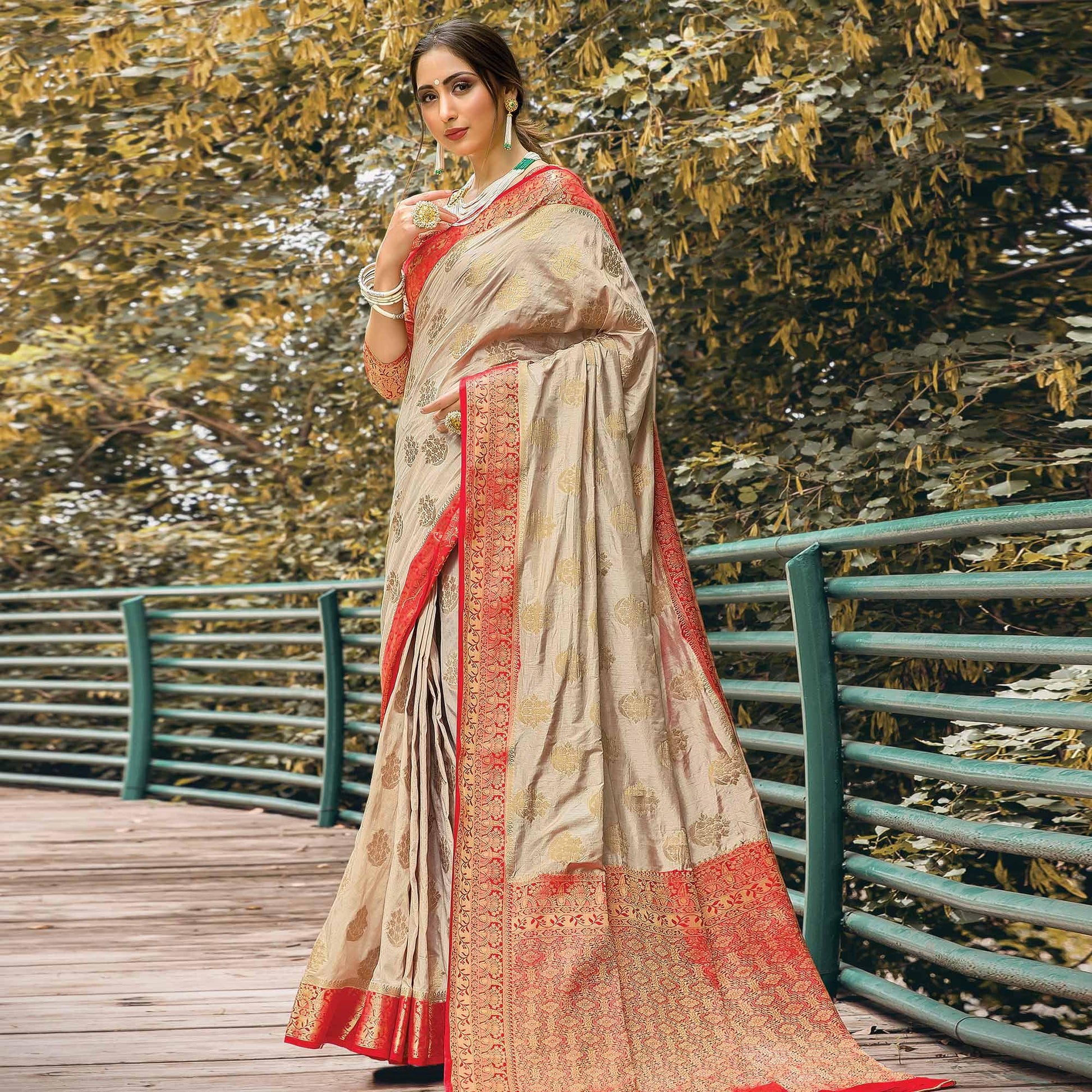Mesmerising Beige Colored Festive Wear Woven Nylon Silk Saree