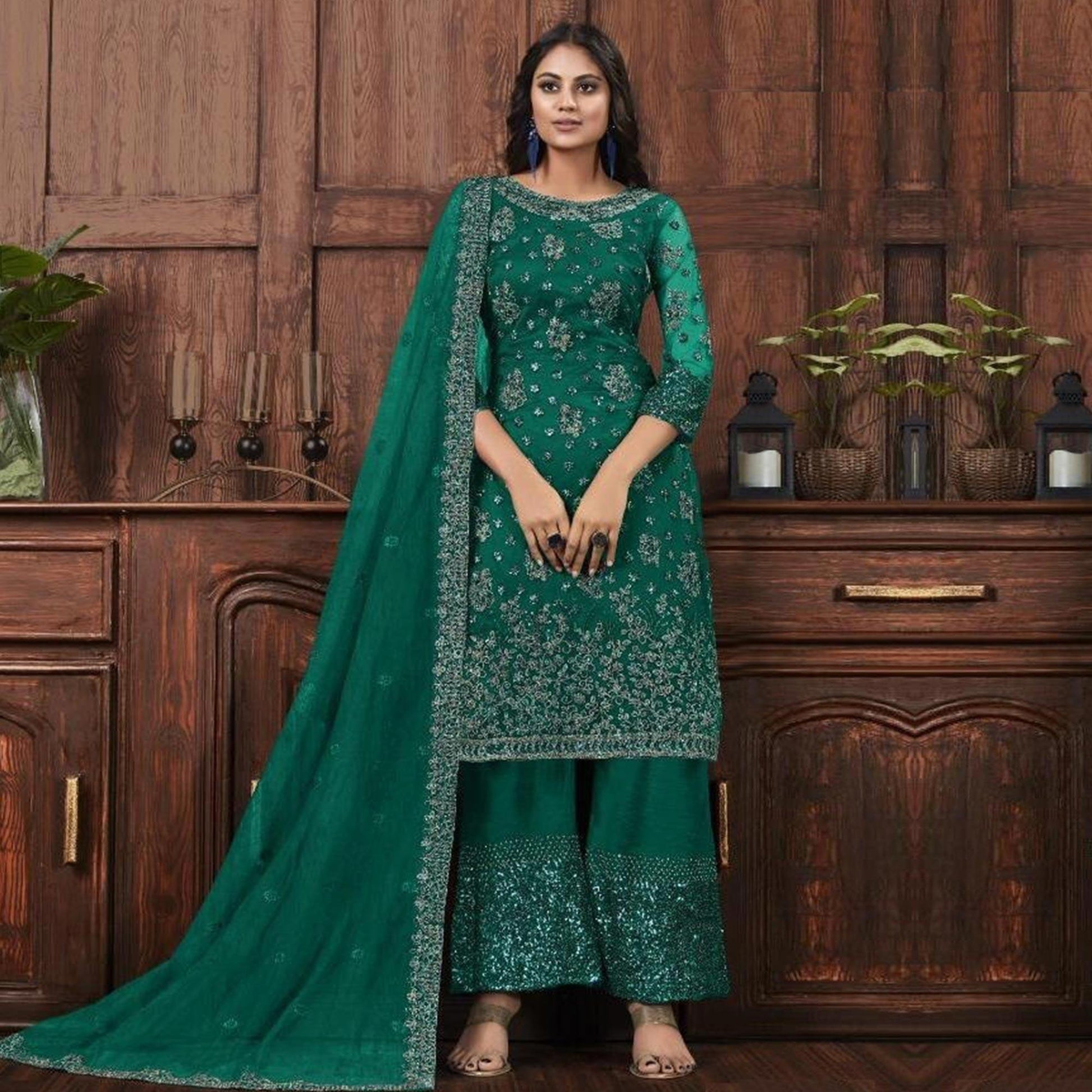 Mesmerising Bottle Green Colored Partywear Embroidered Net Palazzo Suit