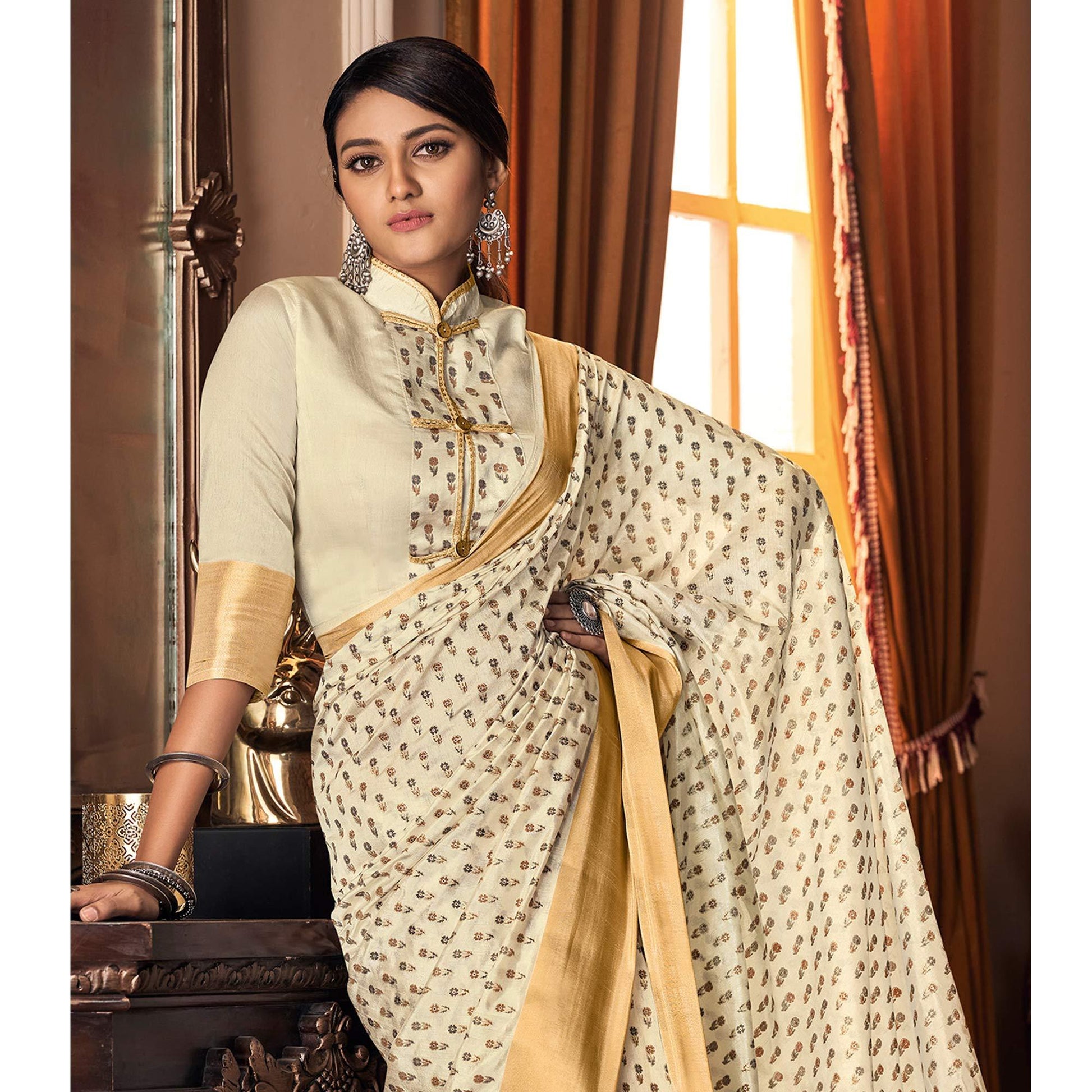 Mesmerising Cream Colored Festive Wear Printed And Woven Border Silk Saree