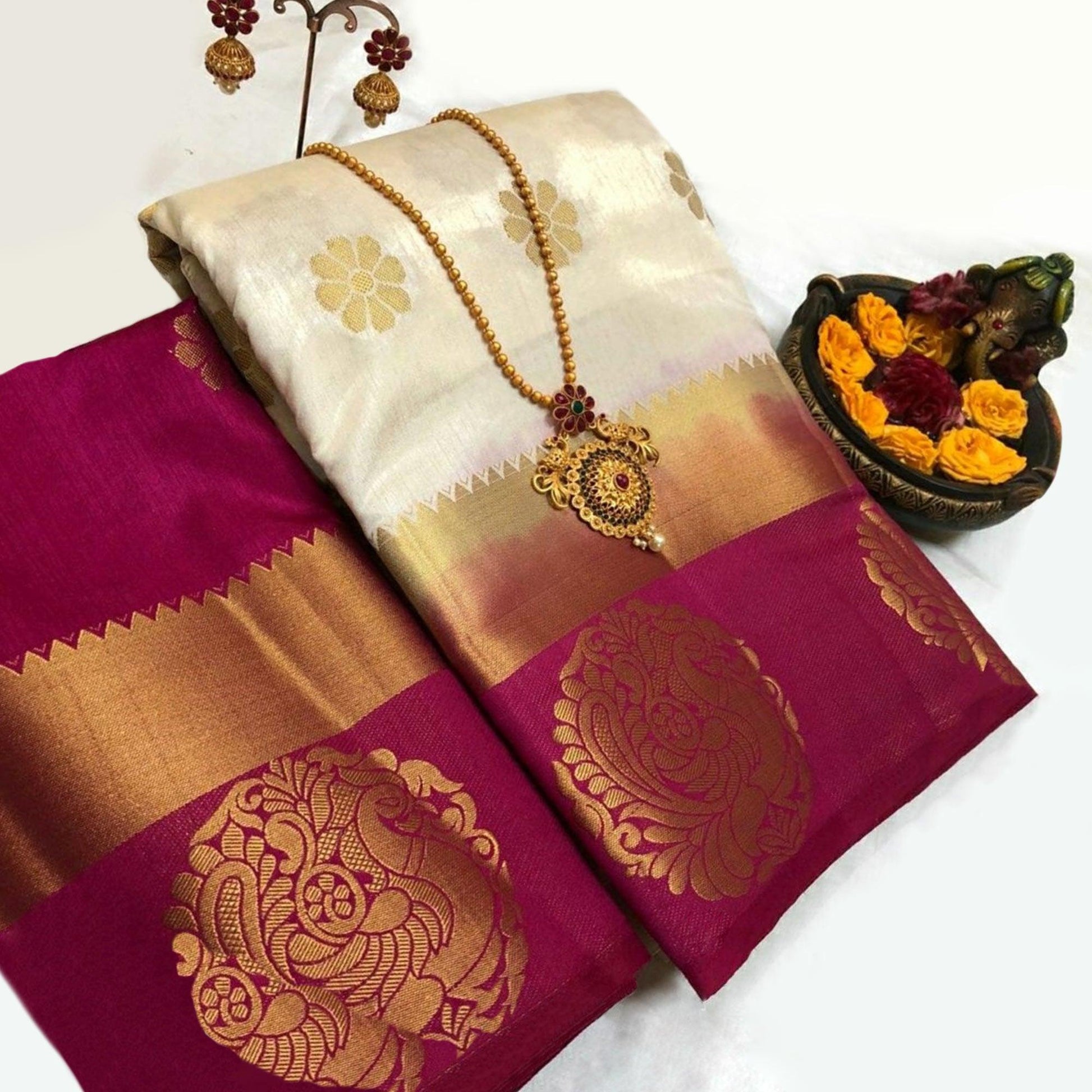 Mesmerising Cream Colored Festive Wear Woven Art Silk Saree