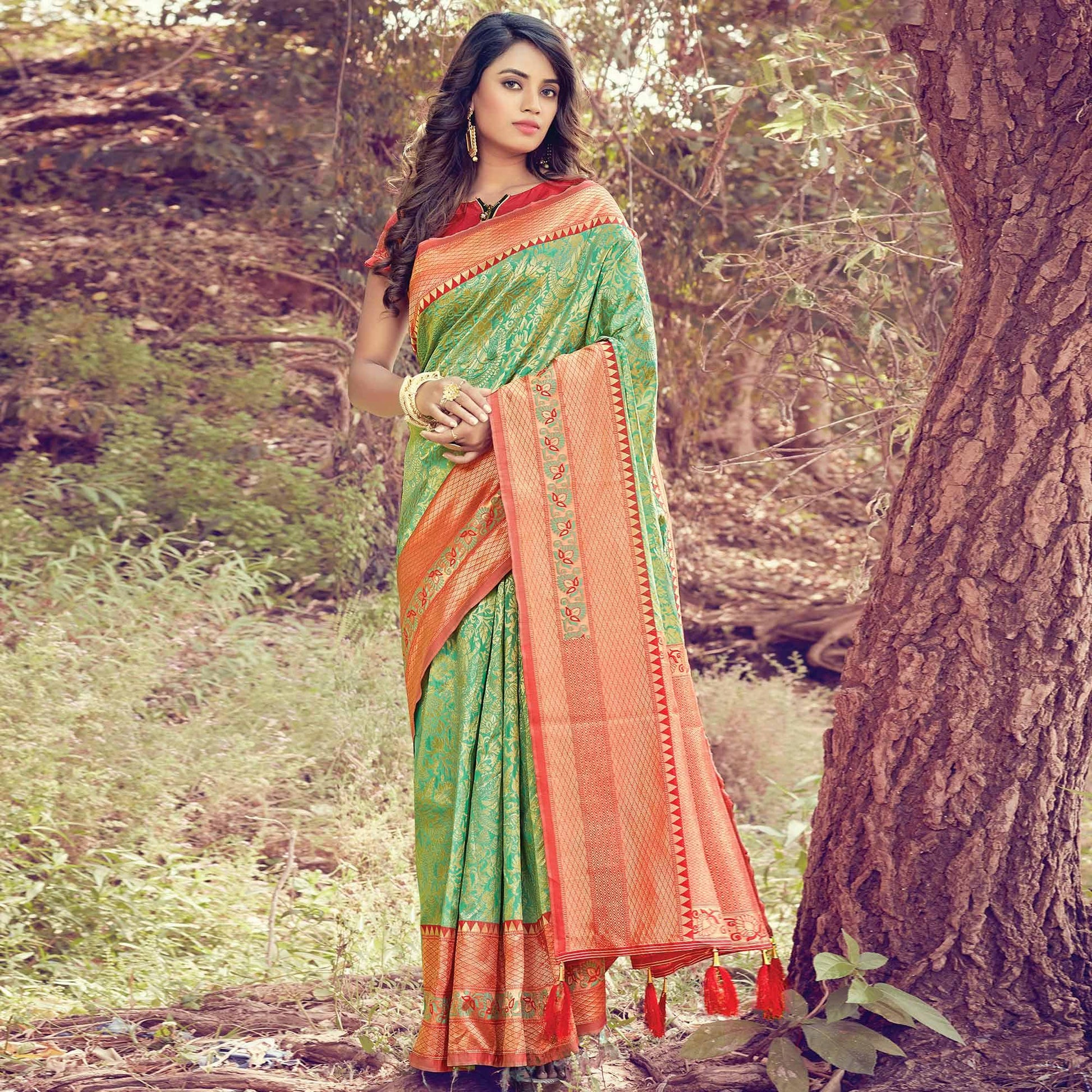 Mesmerising Green Colored Festive Wear Woven Silk Saree
