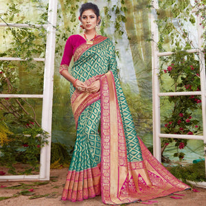 Mesmerising Green Coloured Festive Wear Woven Silk Saree