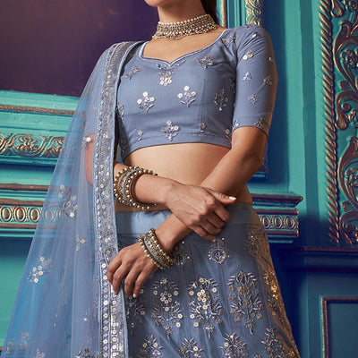 Mesmerising Grey Colored Partywear Embroidered Soft Net Lehenga Choli