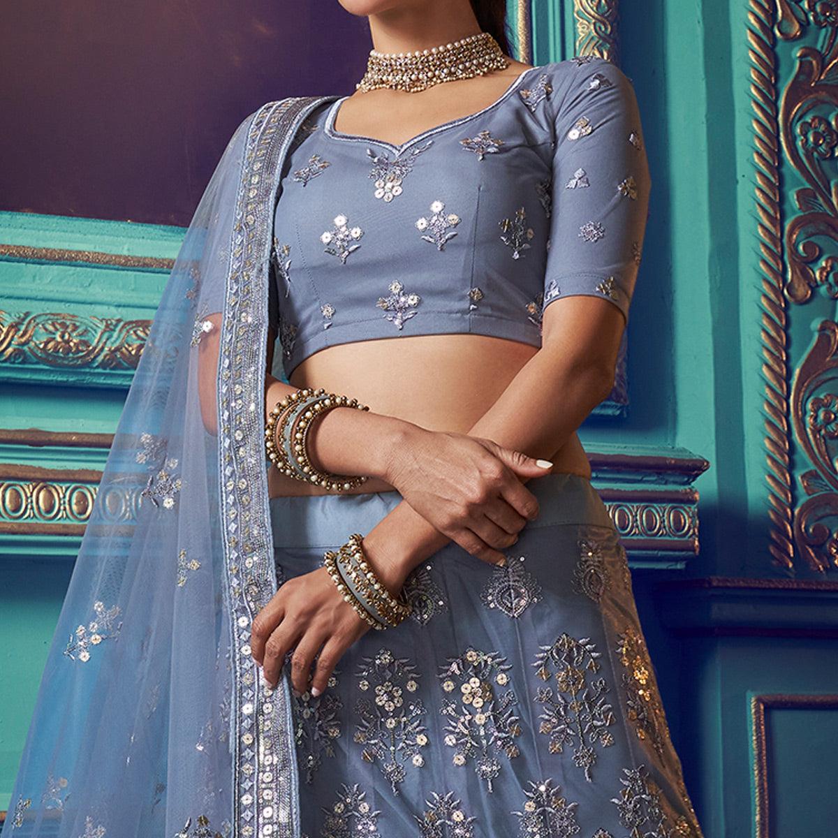 Mesmerising Grey Colored Partywear Embroidered Soft Net Lehenga Choli