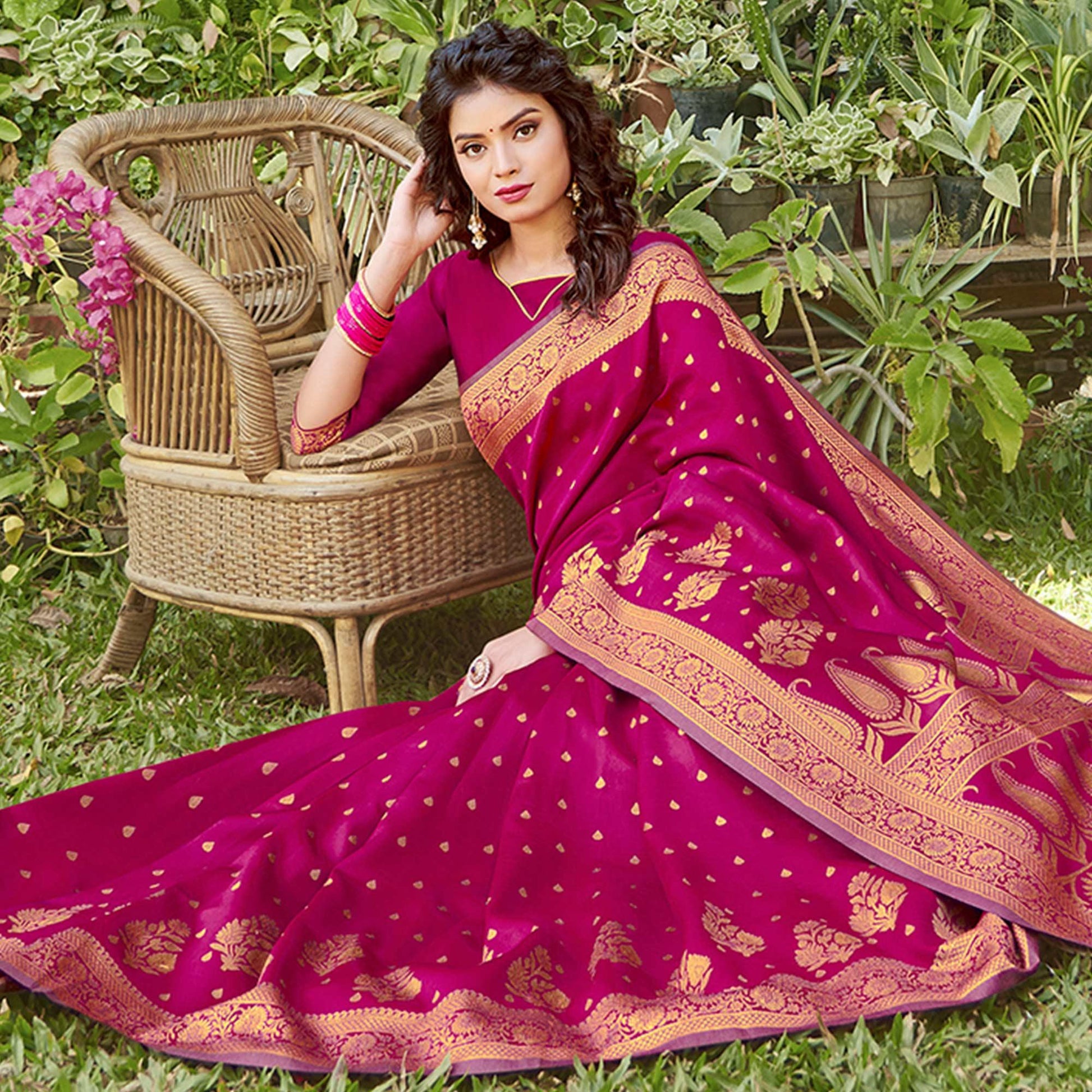 Mesmerising Magenta Pink Colored Festive Wear Floral Woven Silk Blend Saree With Tassels