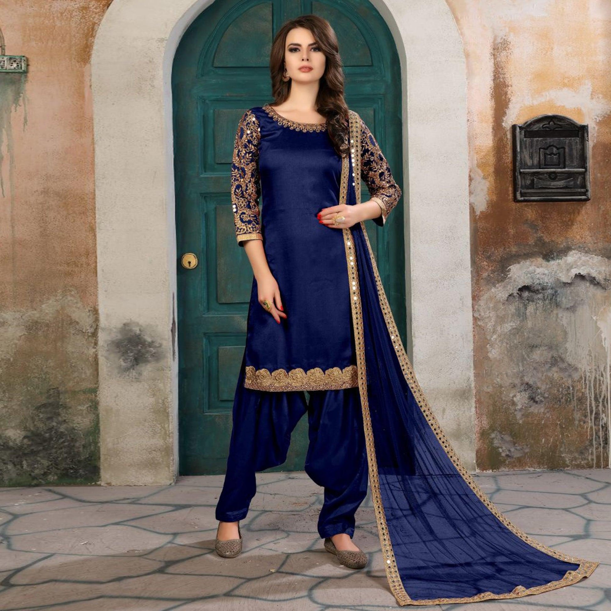 Mesmerising Navy Blue Colored Partywear Embroidered Art Silk Salwar Suit