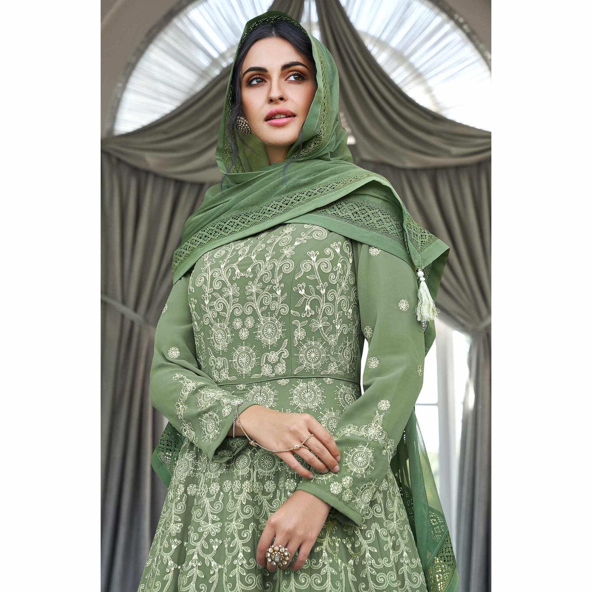 Mesmerising Olive Green Colored Partywear Embroidered Georgette Anarkali Suit