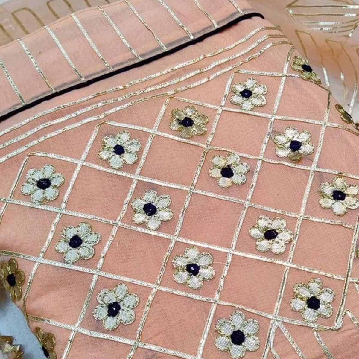 Mesmerising Peach Colored Casual Wear Lace Work Chanderi Dress Material