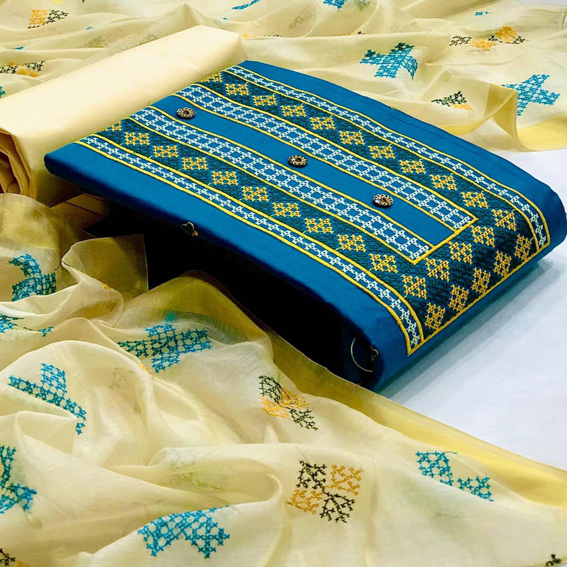 Mesmerising Rama Green Colored Casual Wear Embroidered Cotton Dress Material