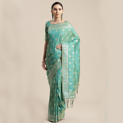 Mesmerising Sea Green Colored Festive Wear Silk Blend Woven Floral Saree With Tassels