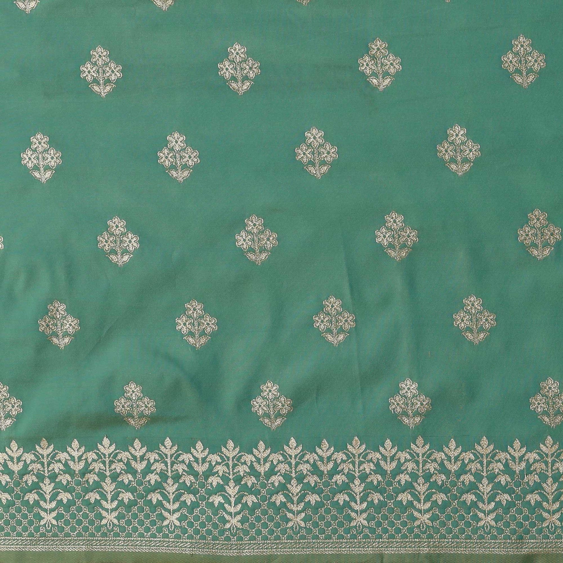 Mesmerising Sea Green Colored Festive Wear Silk Blend Woven Floral Saree With Tassels