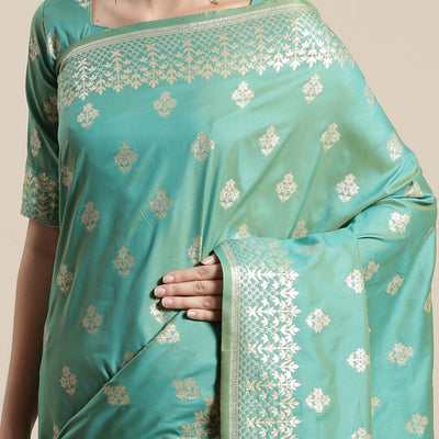 Mesmerising Sea Green Colored Festive Wear Silk Blend Woven Floral Saree With Tassels