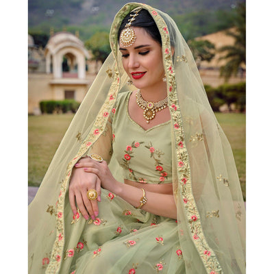 Mint Green Embellished & Embroidered Net Lehenga Choli