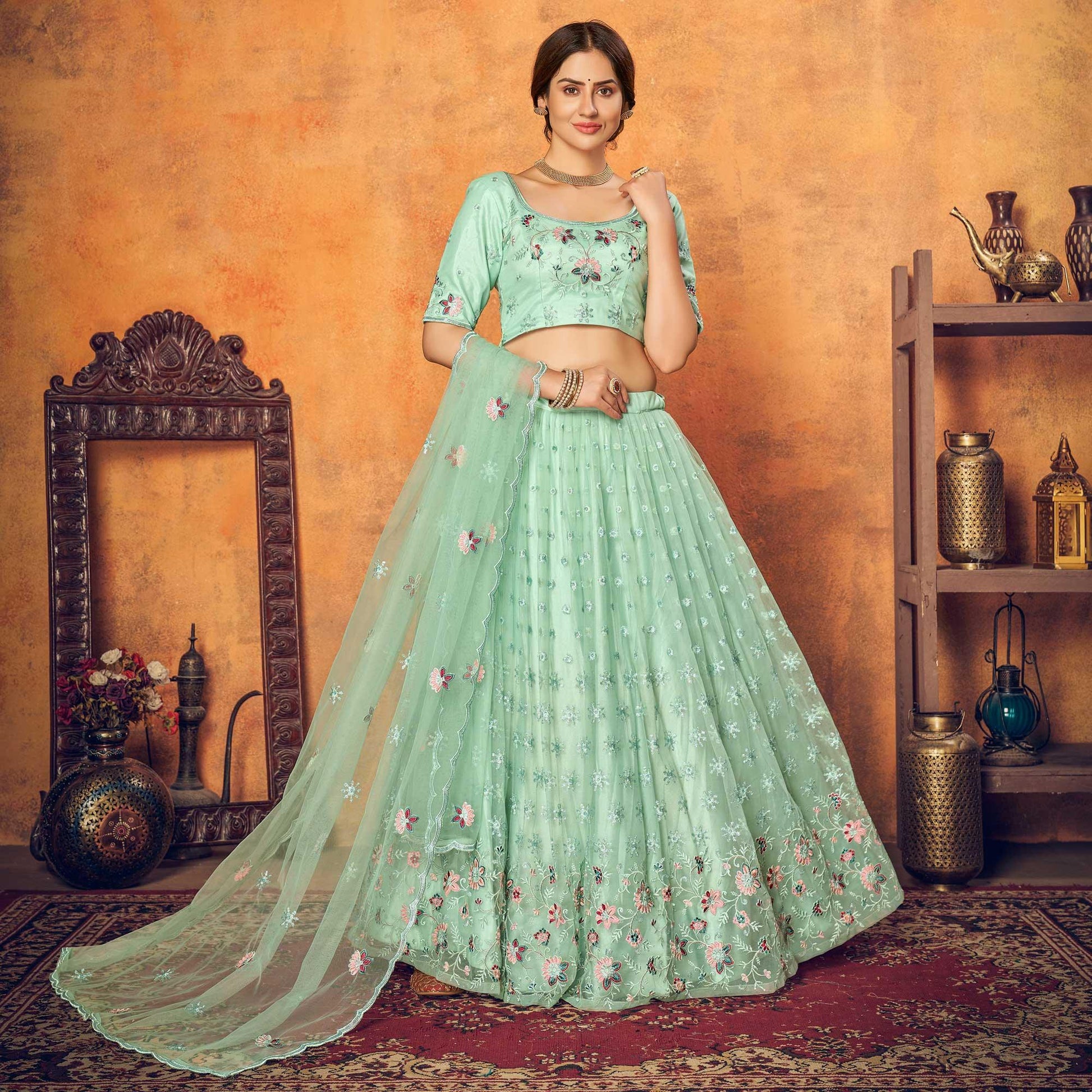 Mint Green Festive Wear Thread With Floral Sequins Embroidered Net Lehenga Choli