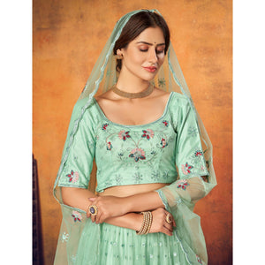 Mint Green Festive Wear Thread With Floral Sequins Embroidered Net Lehenga Choli