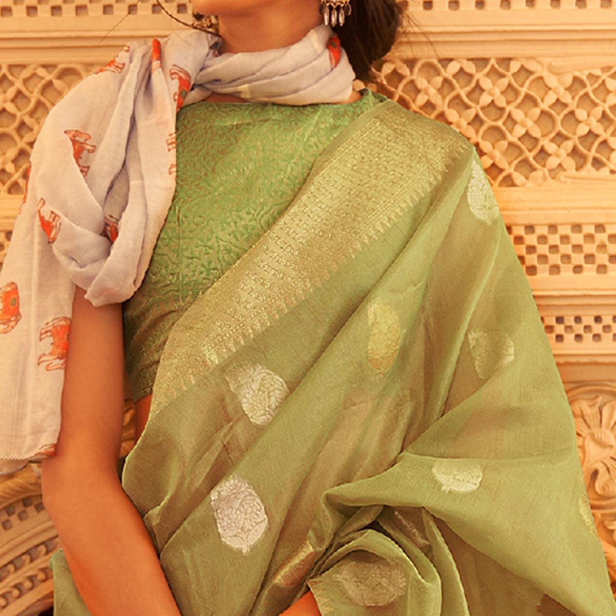 Mint Green Woven Linen Saree With Tassels