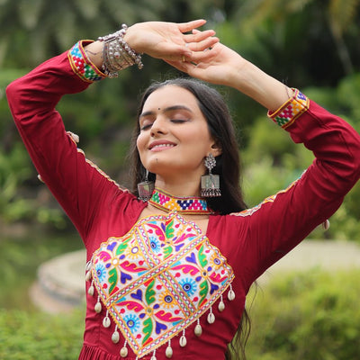 Maroon Partywear Gown with Kutchi Gamthi Work and 3-Layer Frill Stitch