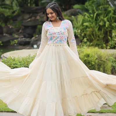 White Kora Cotton Gown with Kutchi Gamthi Work and 4-Layer Frill Stitch