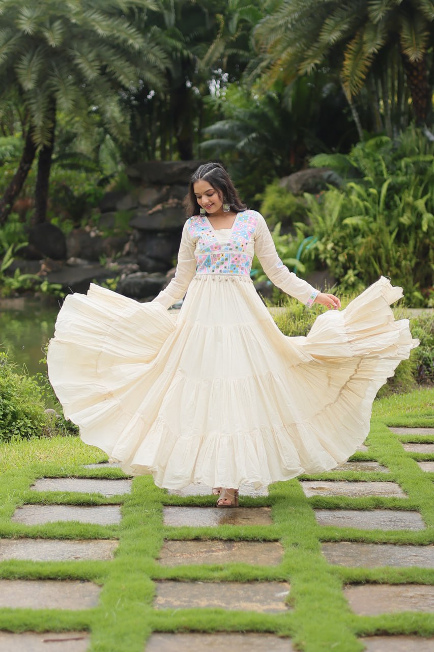 White Kora Cotton Gown with Kutchi Gamthi Work and 4-Layer Frill Stitch
