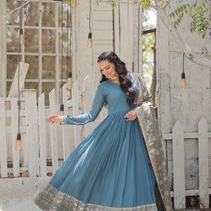 Teal Blue Stunning Faux Georgette Gown with Rich Sequins Embroidery