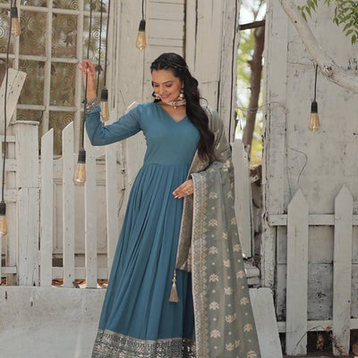 Teal Blue Stunning Faux Georgette Gown with Rich Sequins Embroidery