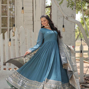 Teal Blue Stunning Faux Georgette Gown with Rich Sequins Embroidery