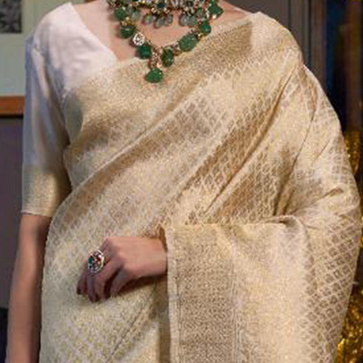 Cream Woven Art Silk Saree With Tassels