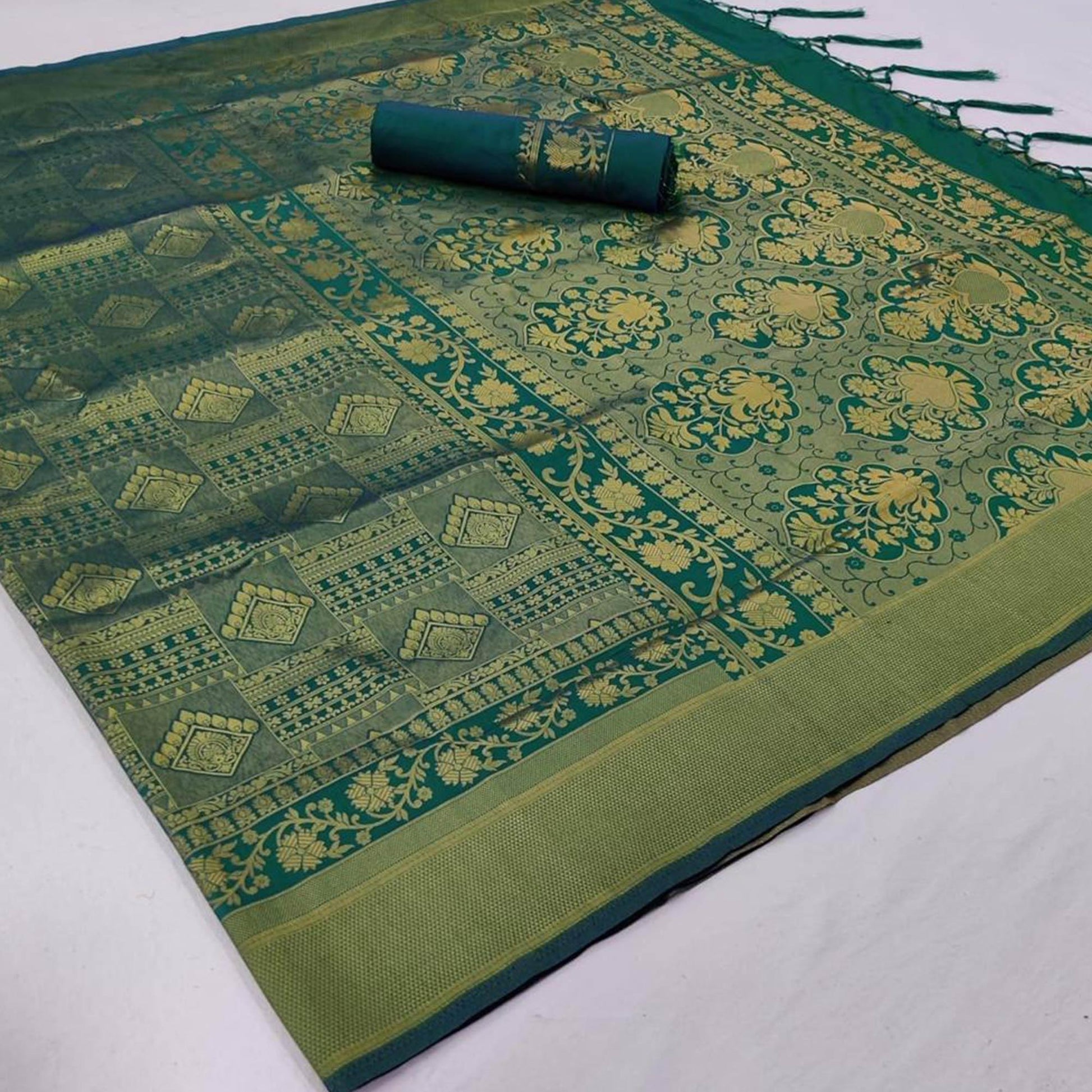 surpassing-green-colored-festive-wear-woven-silk-saree-with-tassels-84176