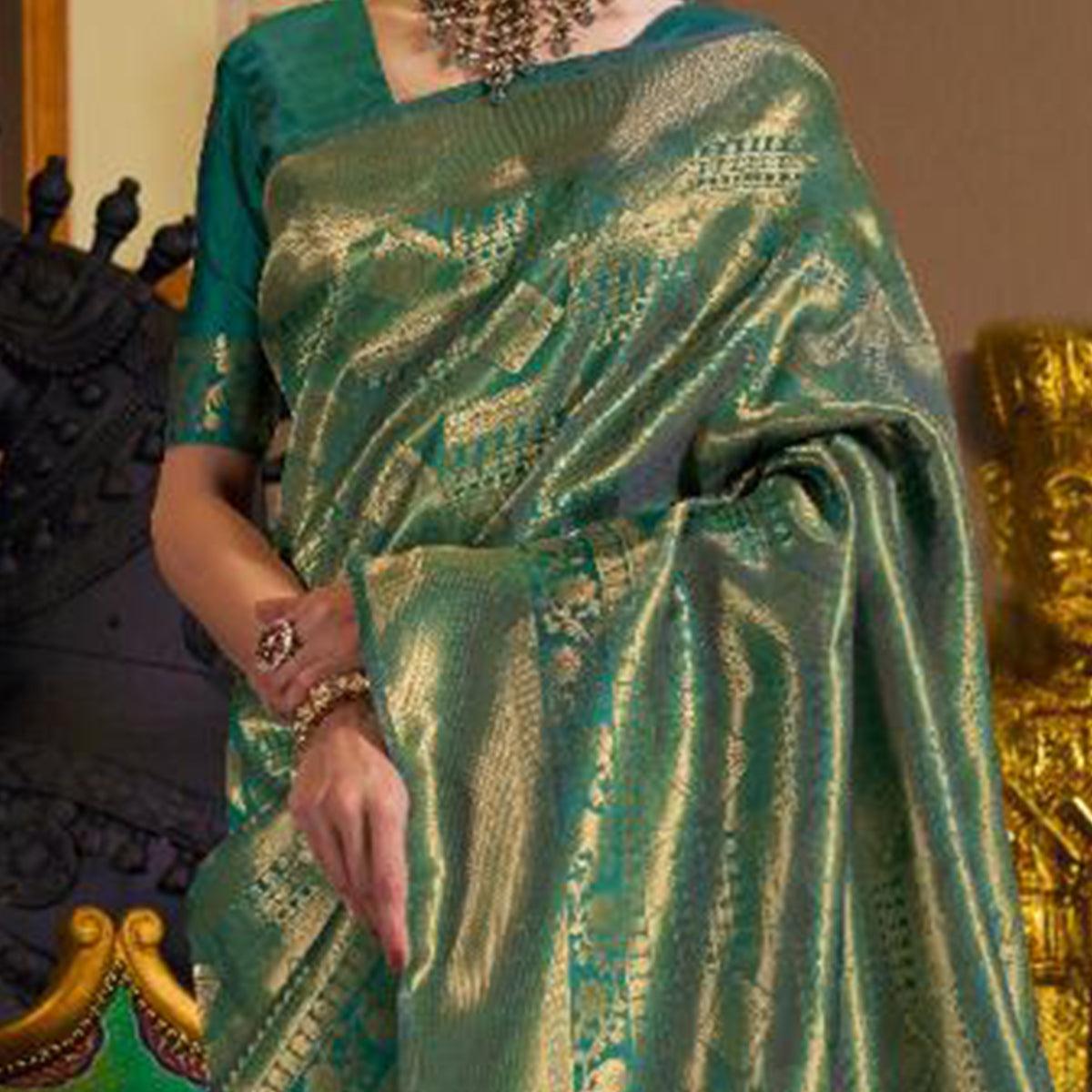 surpassing-green-colored-festive-wear-woven-silk-saree-with-tassels-84176