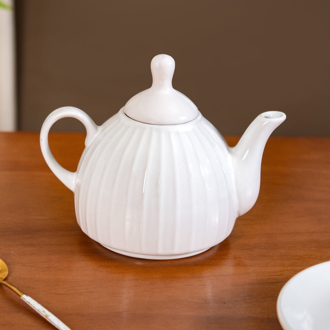 Ambrosia White Ceramic Teapot With Cup And Saucer