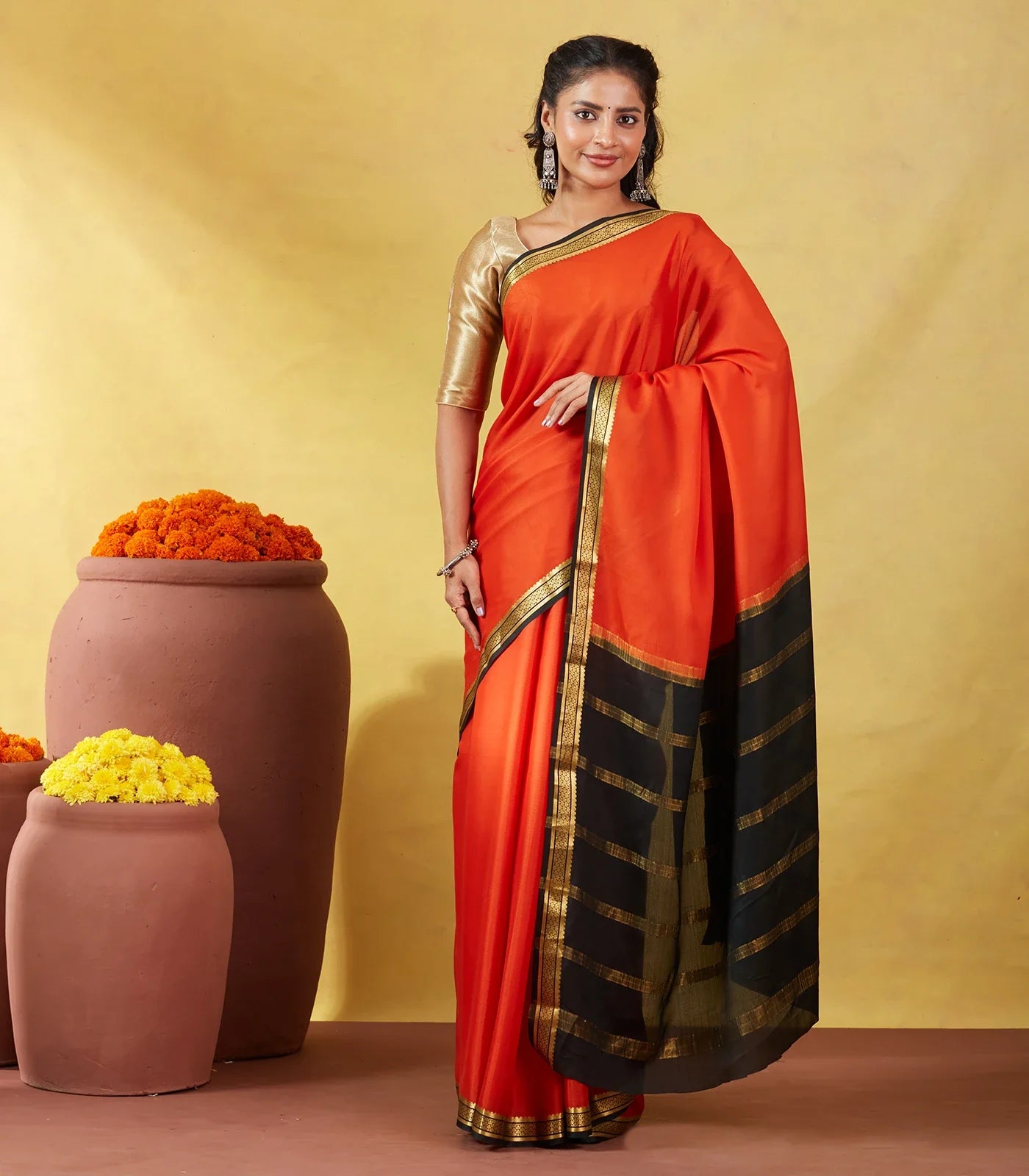 RmKV Orange Mysore Plain Crepe Silk Saree With Black Border