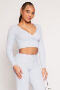 almost_famous Almost Famous Lace Trim Faux Wrap Crop Top